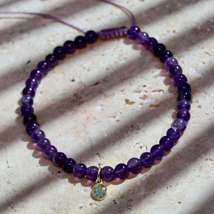 Amethyst gemstone purple bracelet with moon and star charm 