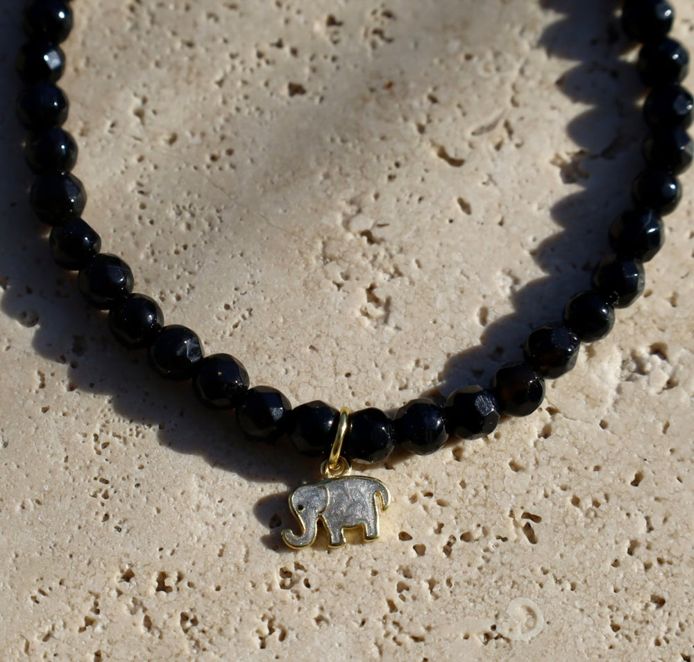 Onyx gemstone bracelet with elephant charm