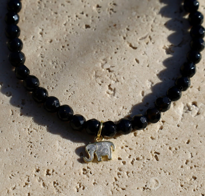 Onyx gemstone bracelet with elephant charm